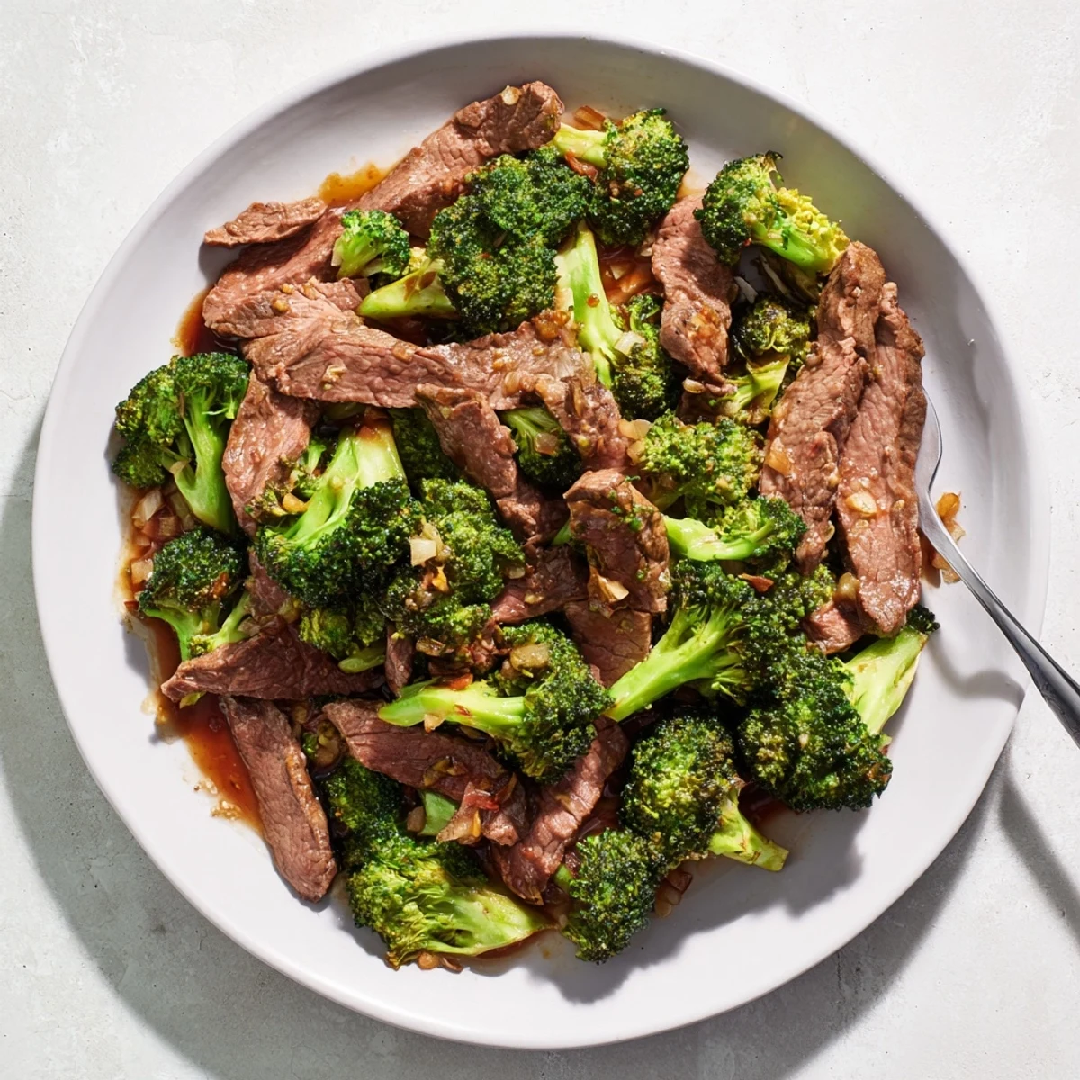 Tender sliced beef and crisp broccoli florets tossed in rich brown glaze