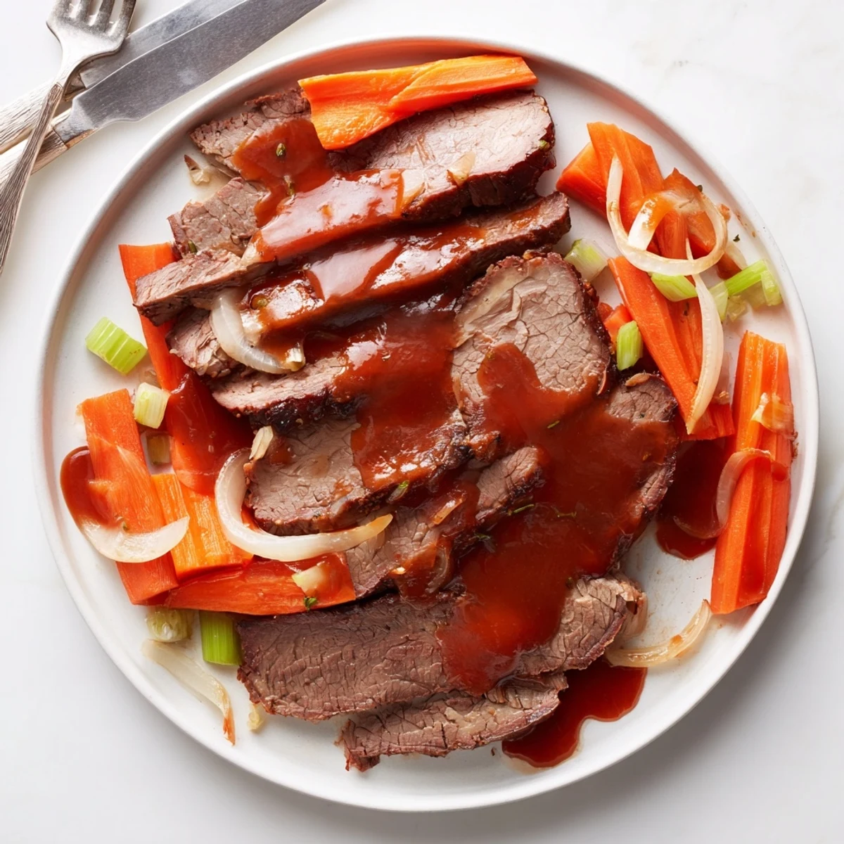 Fork-tender beef brisket slow-cooked for eight hours with caramelized onions and savory vegetables